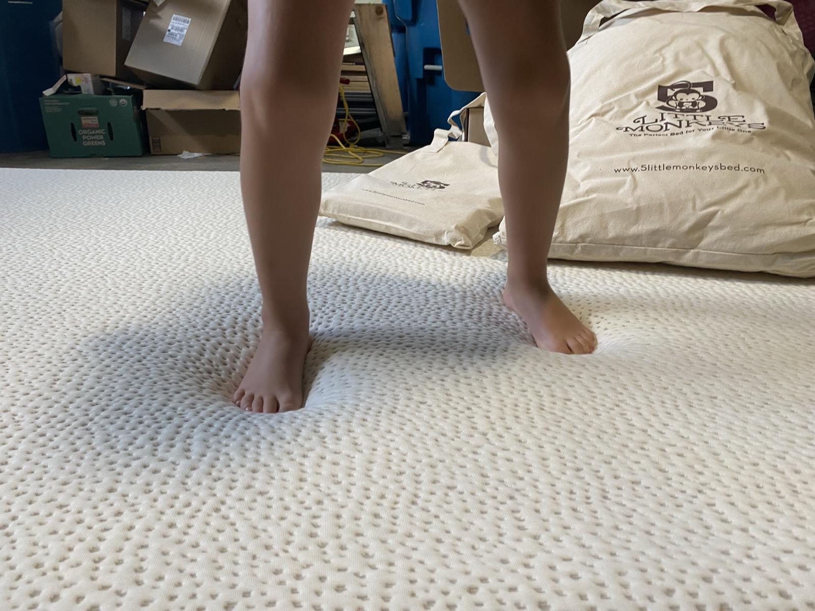 Child on mattress - children are especially vulnerable to mold exposure during sleep